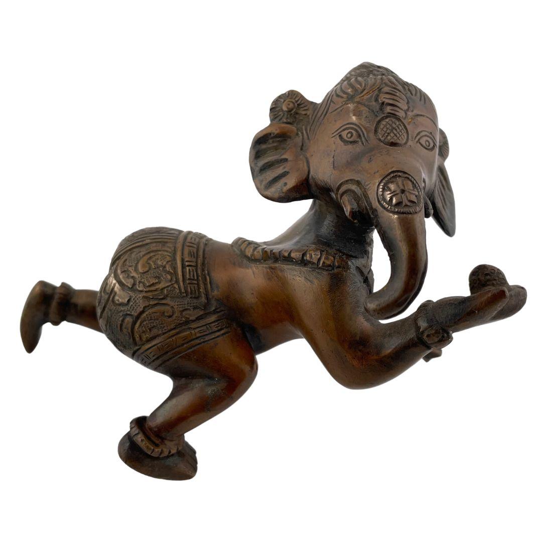 Crawling Ganesh Statue: A Youthful Symbol of Wisdom and Success - Museumize.com